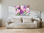 Orchid Haze Bloom floral canvas print on the wall of a living room