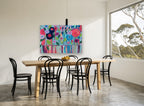 Joyful Flower Vase floral canvas print on the wall of a dining room