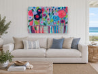 Joyful Flower Vase floral canvas print on the wall of a beach house living room