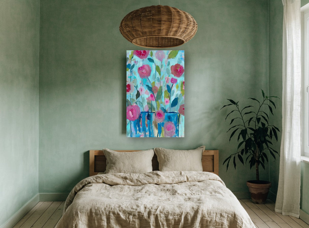 Pink Roses in Blue Vases floral canvas print on the wall of a bedroom