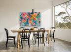 Garden in Full Chorus floral canvas print on the wall of a dining room