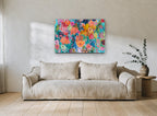 Garden in Full Chorus floral canvas print on the wall of a living room
