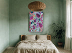 Lilac Garden Chorus floral canvas print on the wall of a bedroom