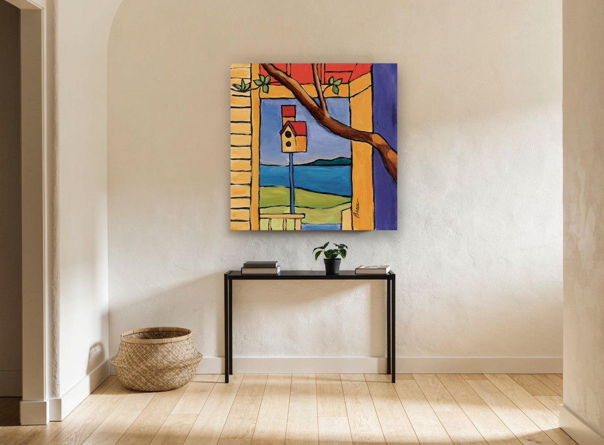 Birdhouse By The Bay coastal canvas print on the wall of a hallway