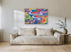 Winding River Blooms floral canvas print on the wall of a living room