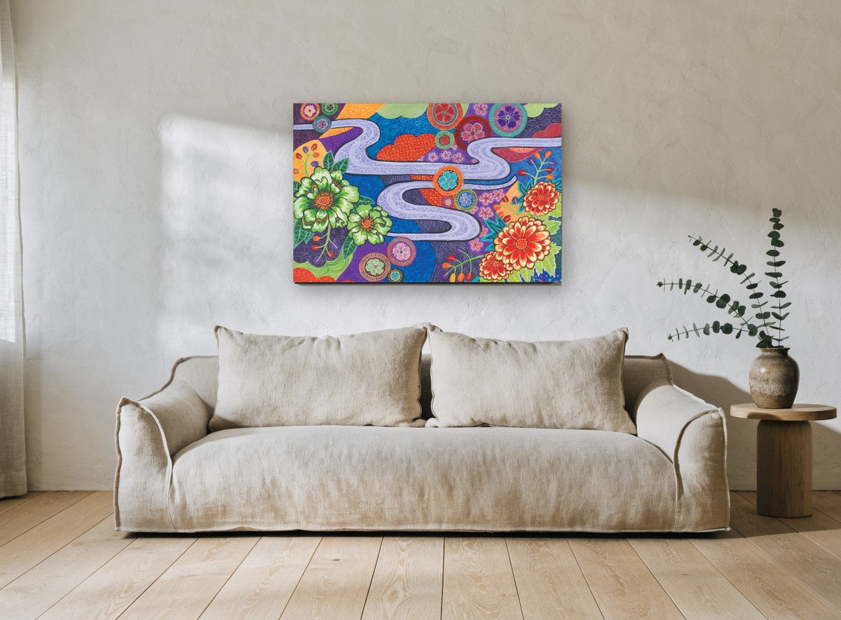 Winding River Blooms floral canvas print on the wall of a living room