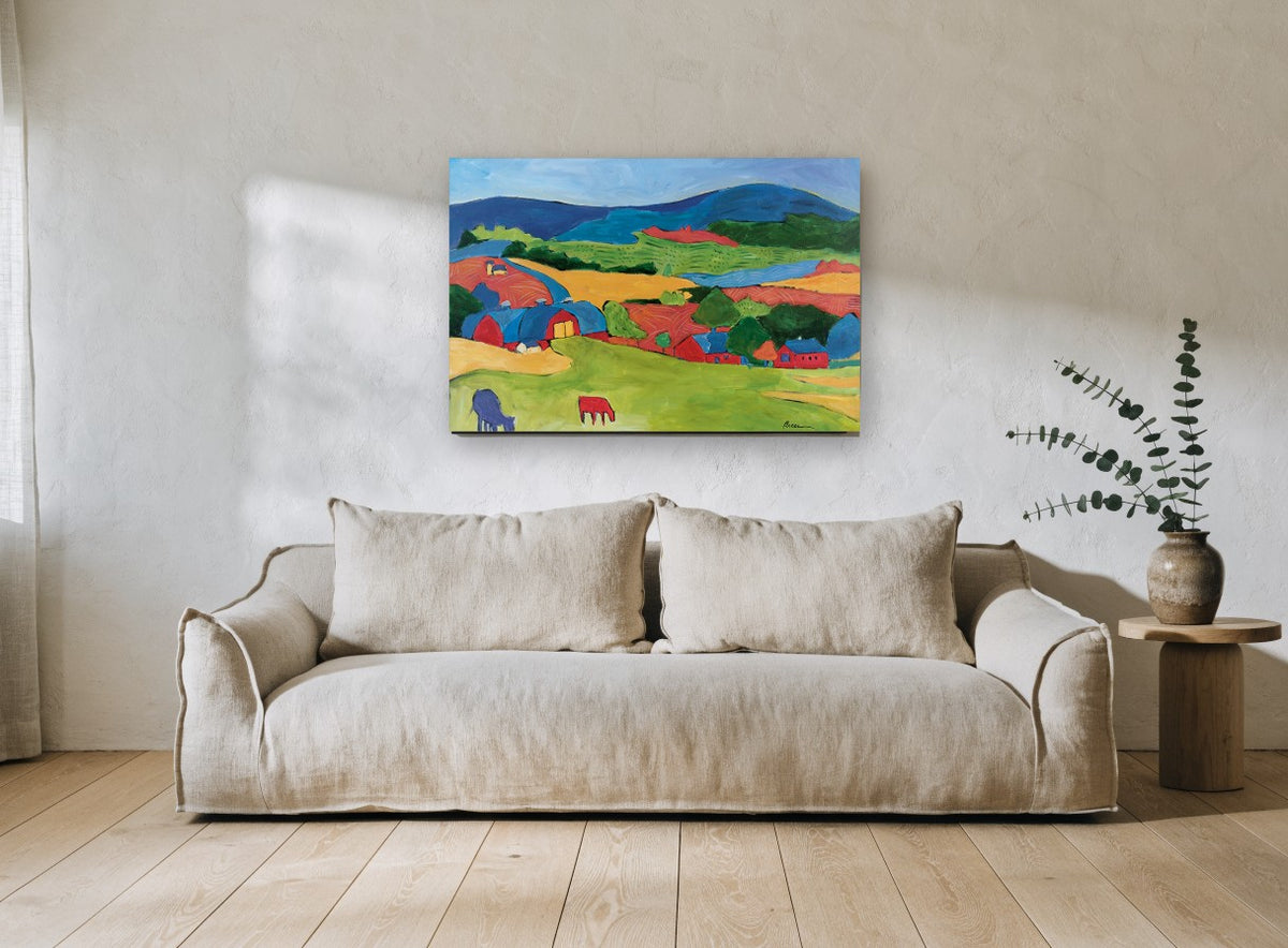 Red Barns Patchwork Hills landscape canvas print on the wall of a living room