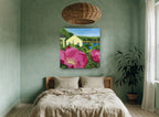 Beach Rose Cottage coastal canvas print on the wall of a bedroom