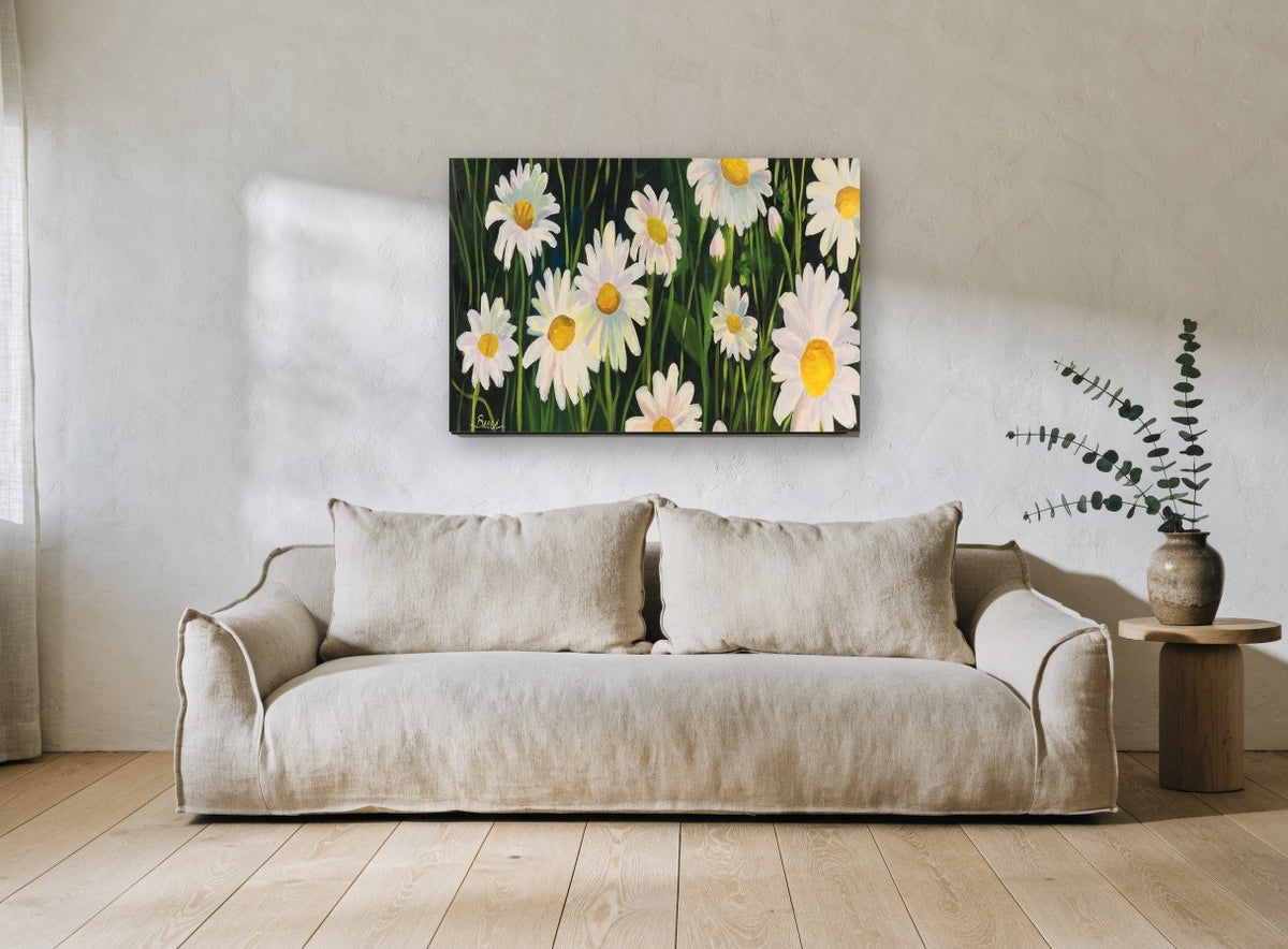 Daisies in Dark Grass floral canvas print on the wall of a living room