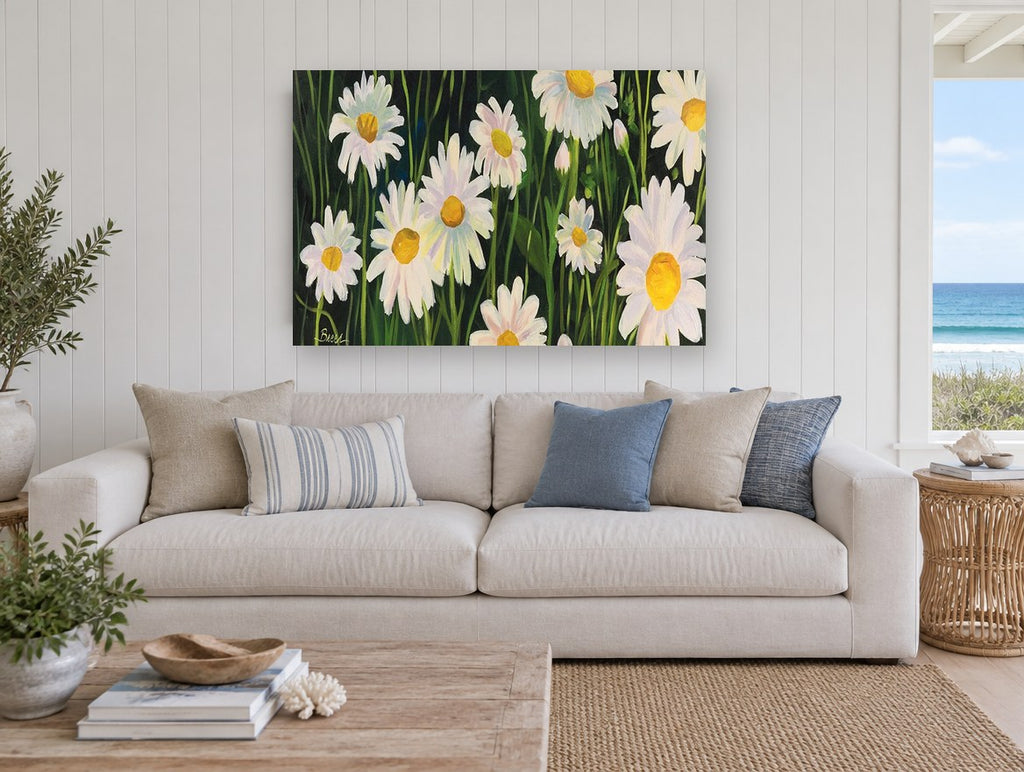 Daisies in Dark Grass floral canvas print on the wall of a beach house living room