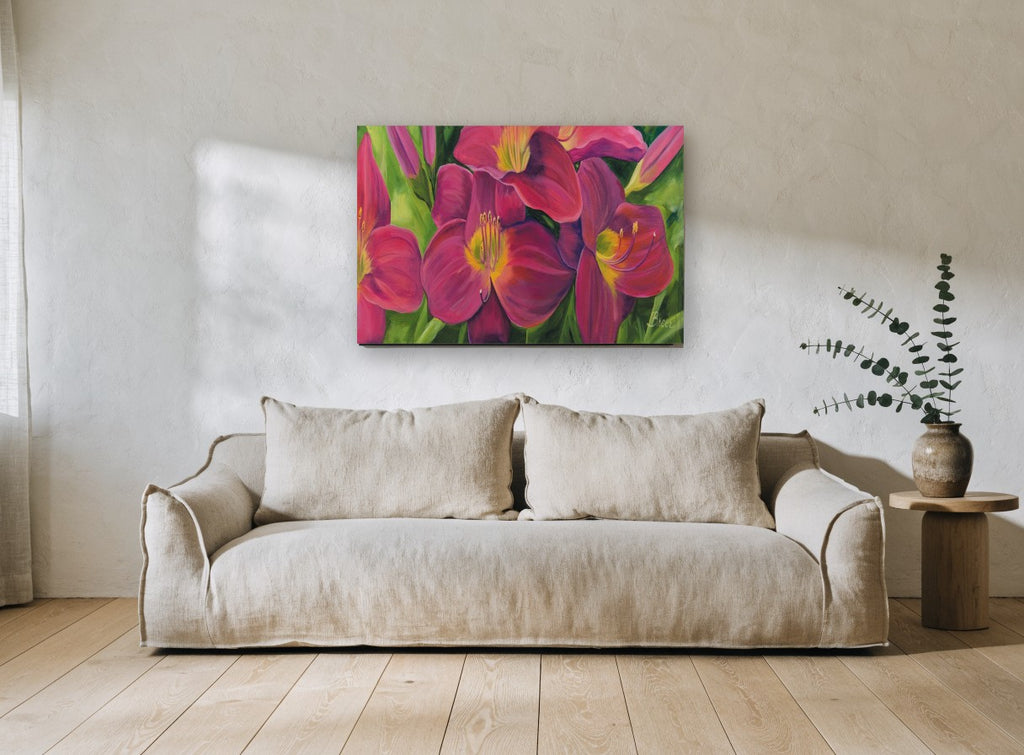 Magenta Daylily Garden floral canvas print on the wall of a living room