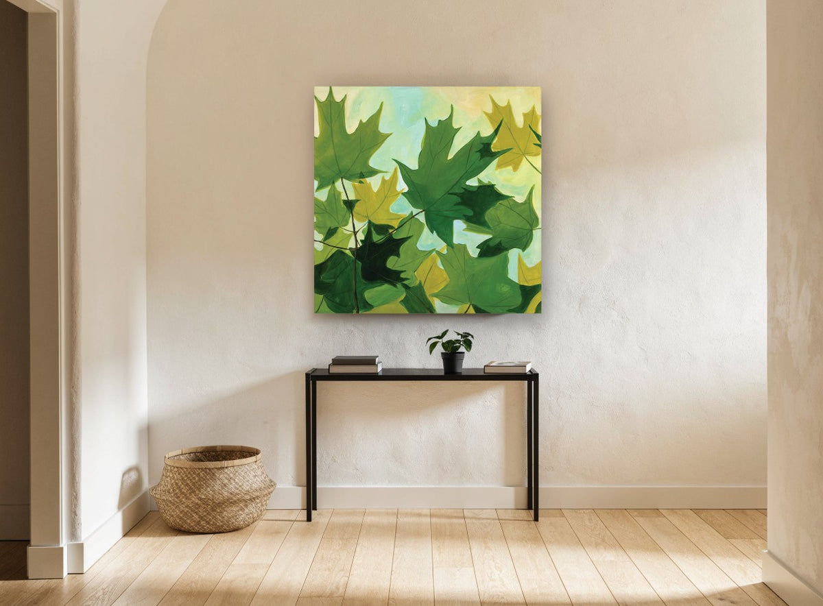 Maple Canopy Greens floral canvas print on the wall of a hallway