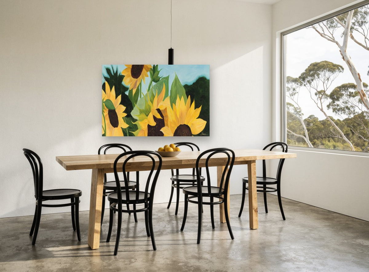 Sunflowers Against Blue floral canvas print on the wall of a dining room