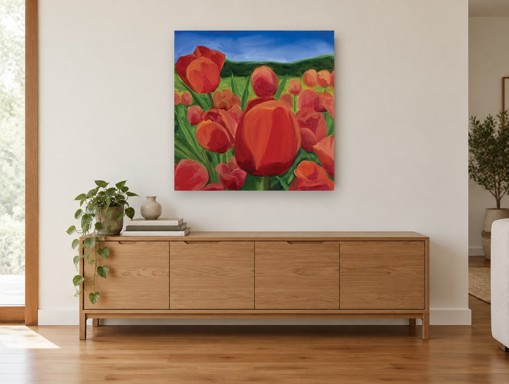Red Tulip Meadow floral canvas print on the wall of a living room above a sideboard