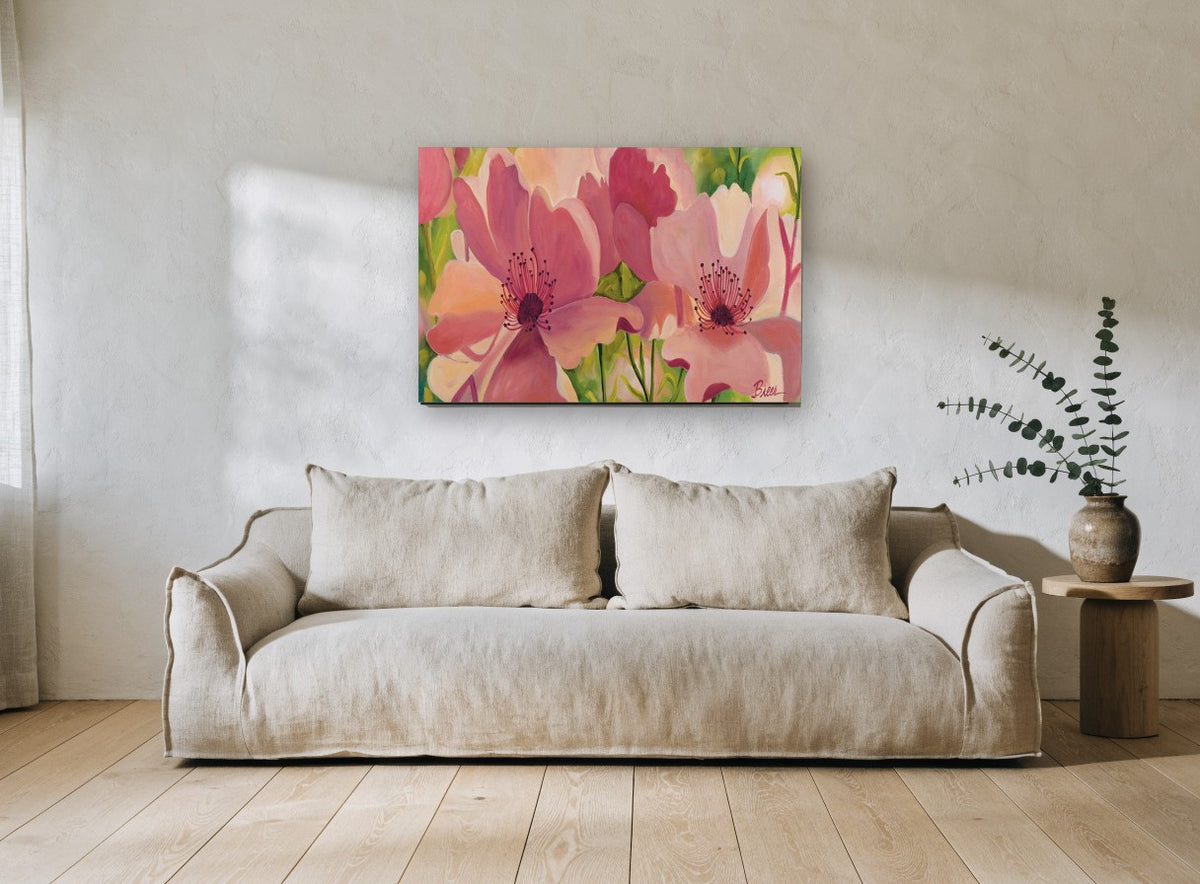 Blushing Poppy Garden floral canvas print on the wall of a living room
