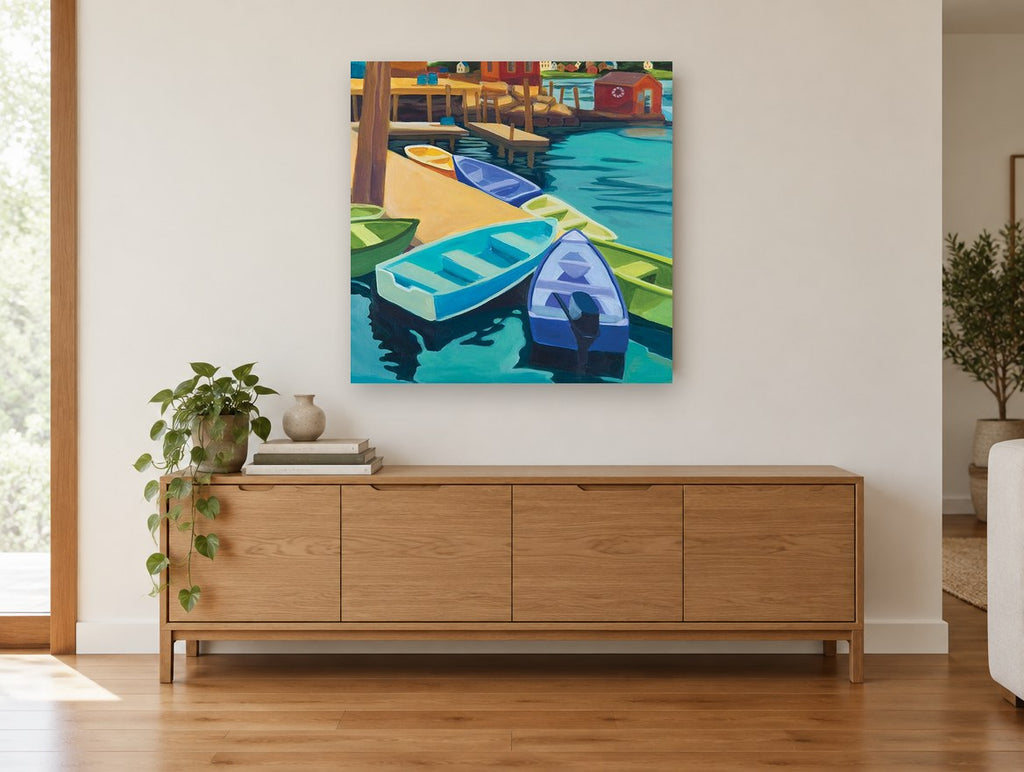Dinghies at the Dock coastal canvas print on the wall of a living room above a sideboard