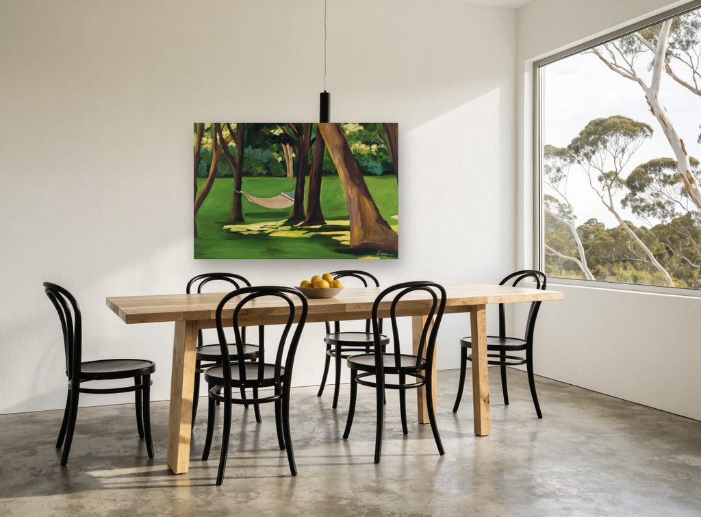 Hammock Under the Shade landscape canvas print on the wall of a dining room