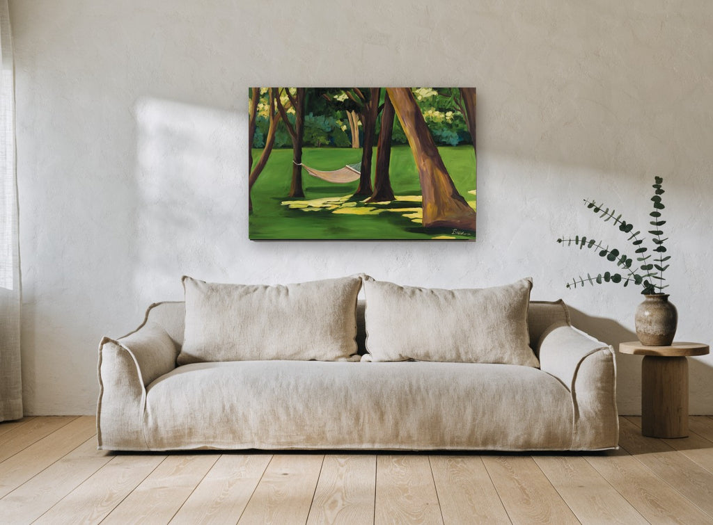 Hammock Under the Shade landscape canvas print on the wall of a living room