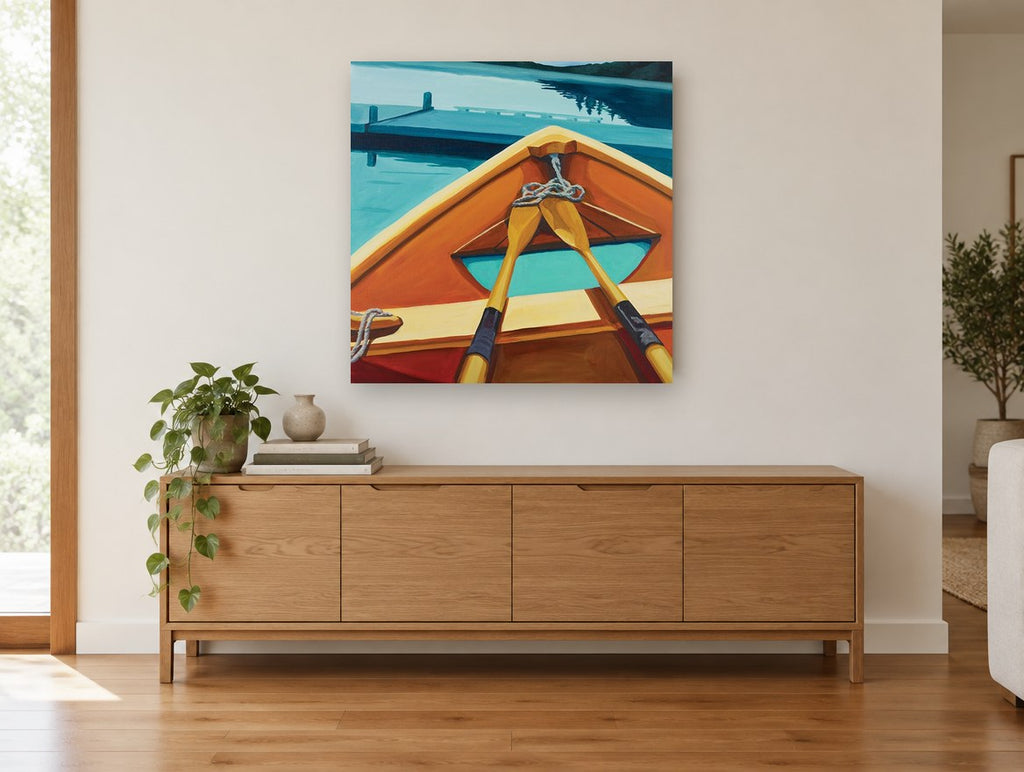 Orange Rowboat Bow landscape canvas print on the wall of a living room above a sideboard