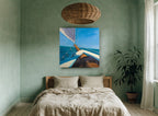 Bow Over Blue Water coastal canvas print on the wall of a bedroom