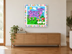 Purple Cow Poem animal canvas print on the wall of a living room above a sideboard