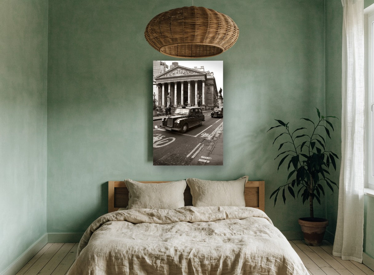 Black Cab at the Exchange city canvas print on the wall of a bedroom