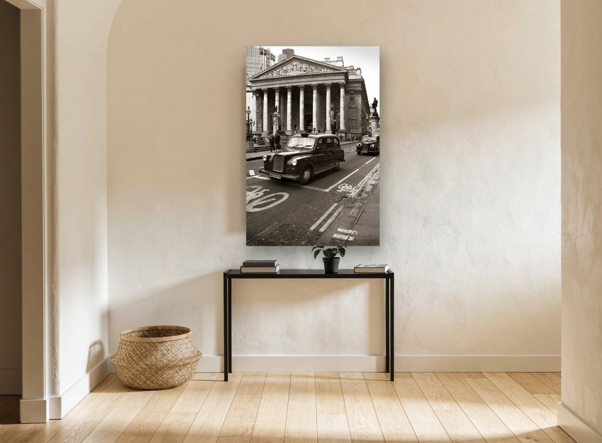 Black Cab at the Exchange city canvas print on the wall of a hallway