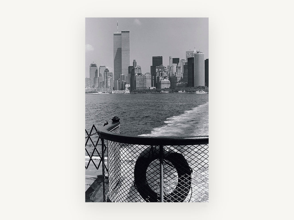 Ferry Wake Downtown, new york skyline from ferry black and white photograph, city canvas wall art print, front view