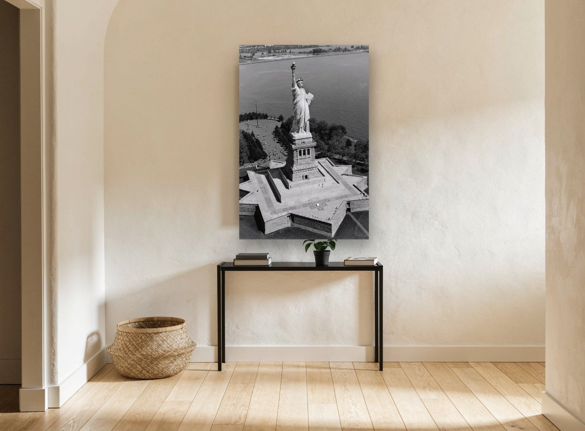 Liberty From Above city canvas print on the wall of a hallway