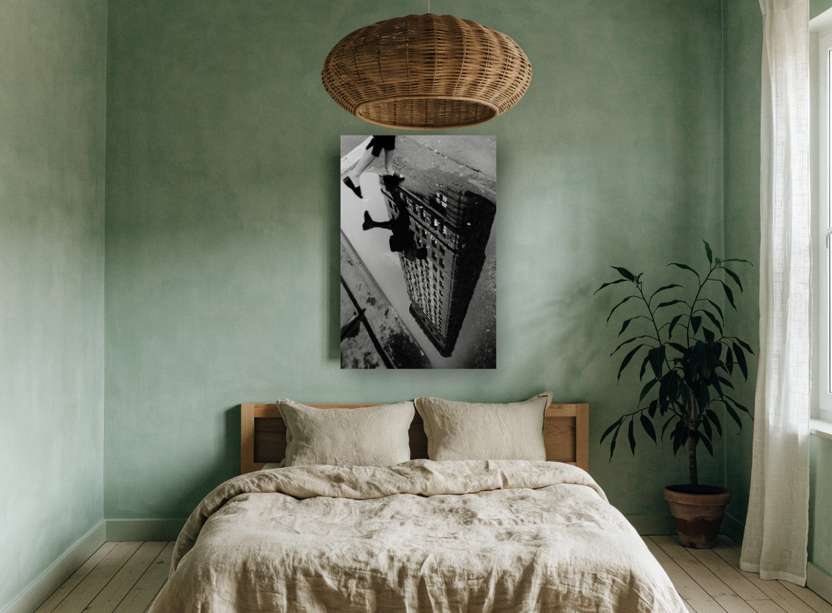 Flatiron Puddle Step city canvas print on the wall of a bedroom