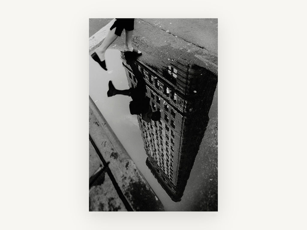 Flatiron Puddle Step, flatiron building puddle reflection black and white photograph, city canvas wall art print, front view