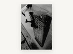 Flatiron Puddle Step, flatiron building puddle reflection black and white photograph, city canvas wall art print, front view