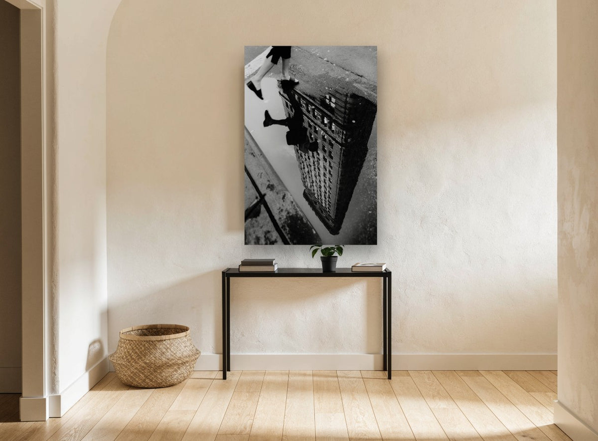 Flatiron Puddle Step city canvas print on the wall of a hallway