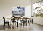 Harbour Under Cumulus coastal canvas print on the wall of a dining room