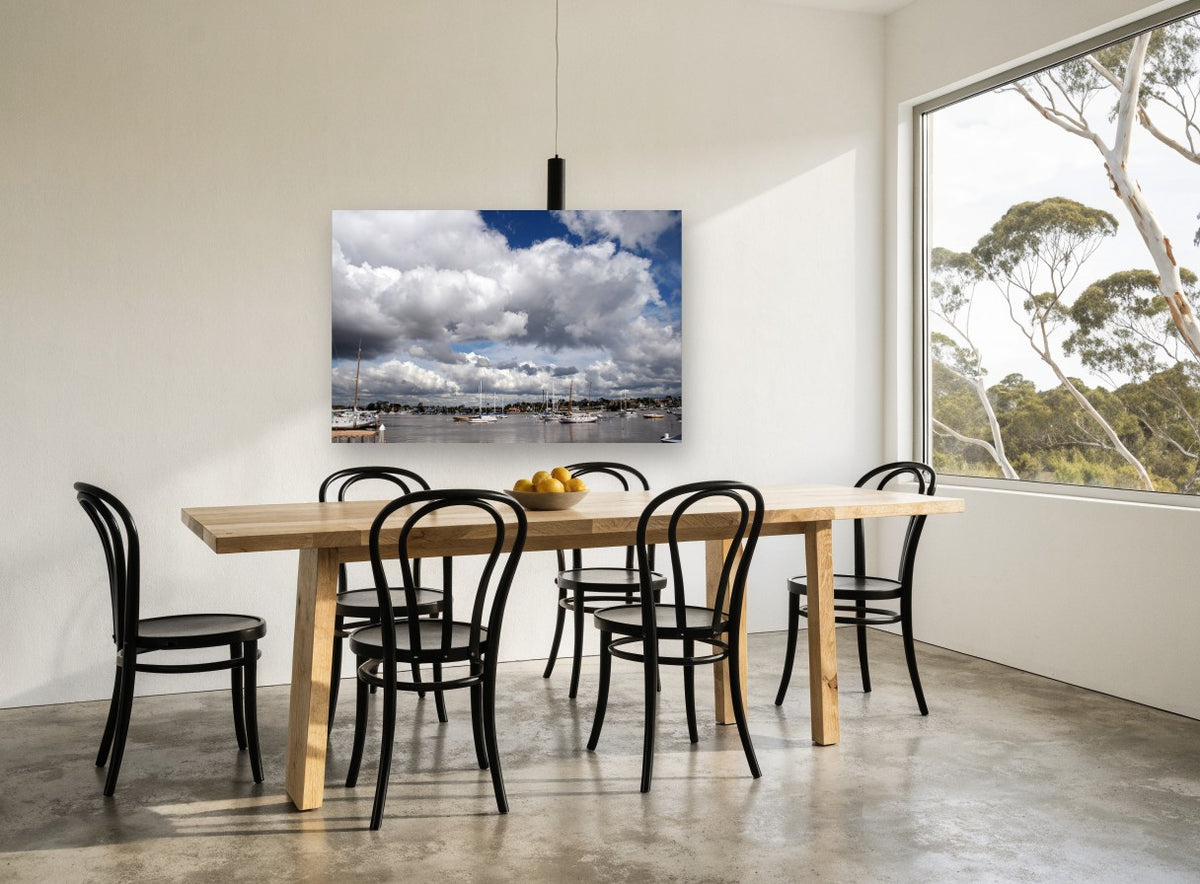 Harbour Under Cumulus coastal canvas print on the wall of a dining room