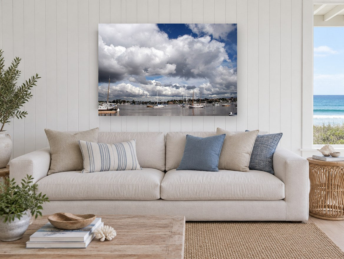Harbour Under Cumulus coastal canvas print on the wall of a beach house living room