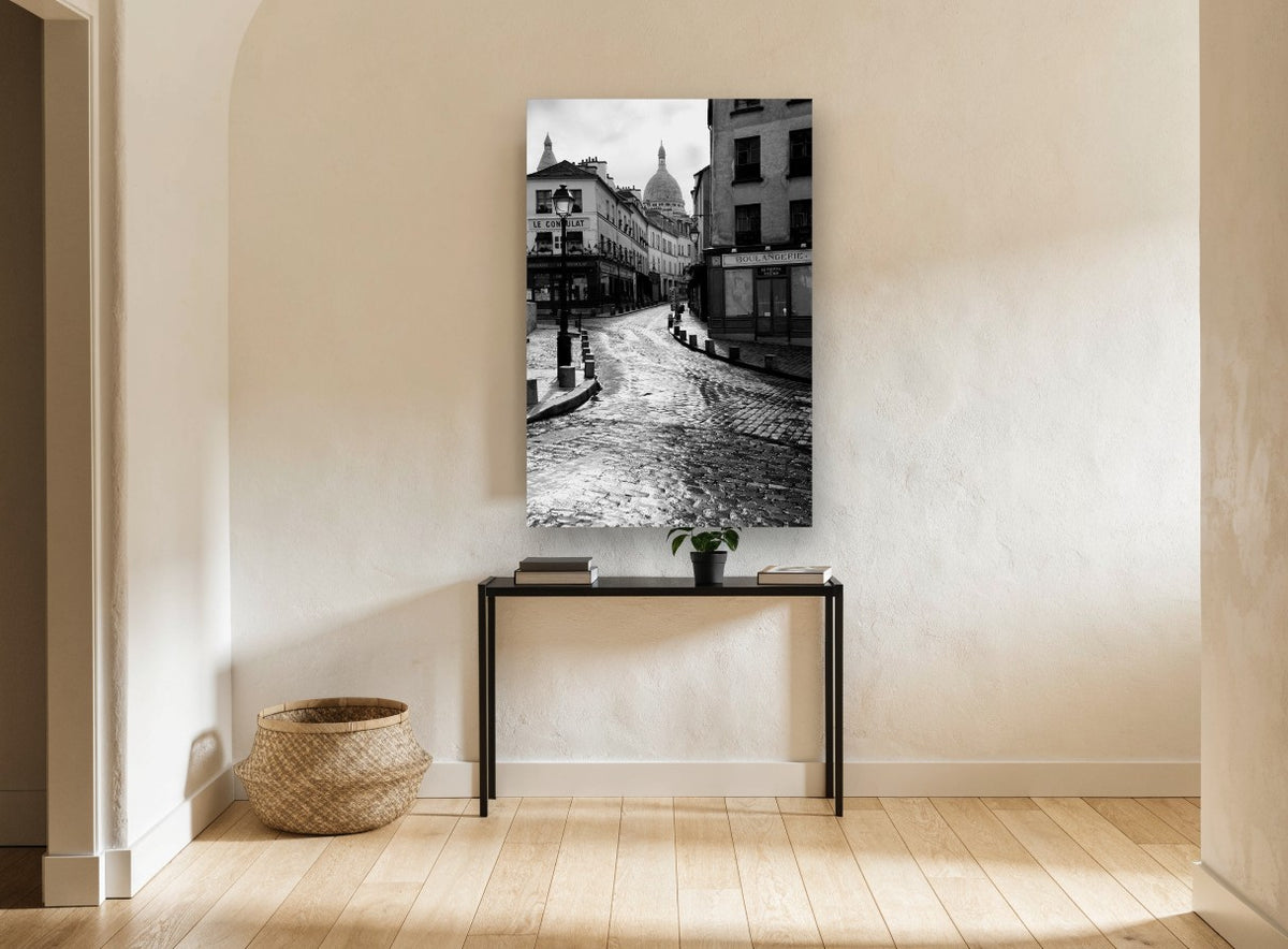 Wet Cobbles of Montmartre city canvas print on the wall of a hallway