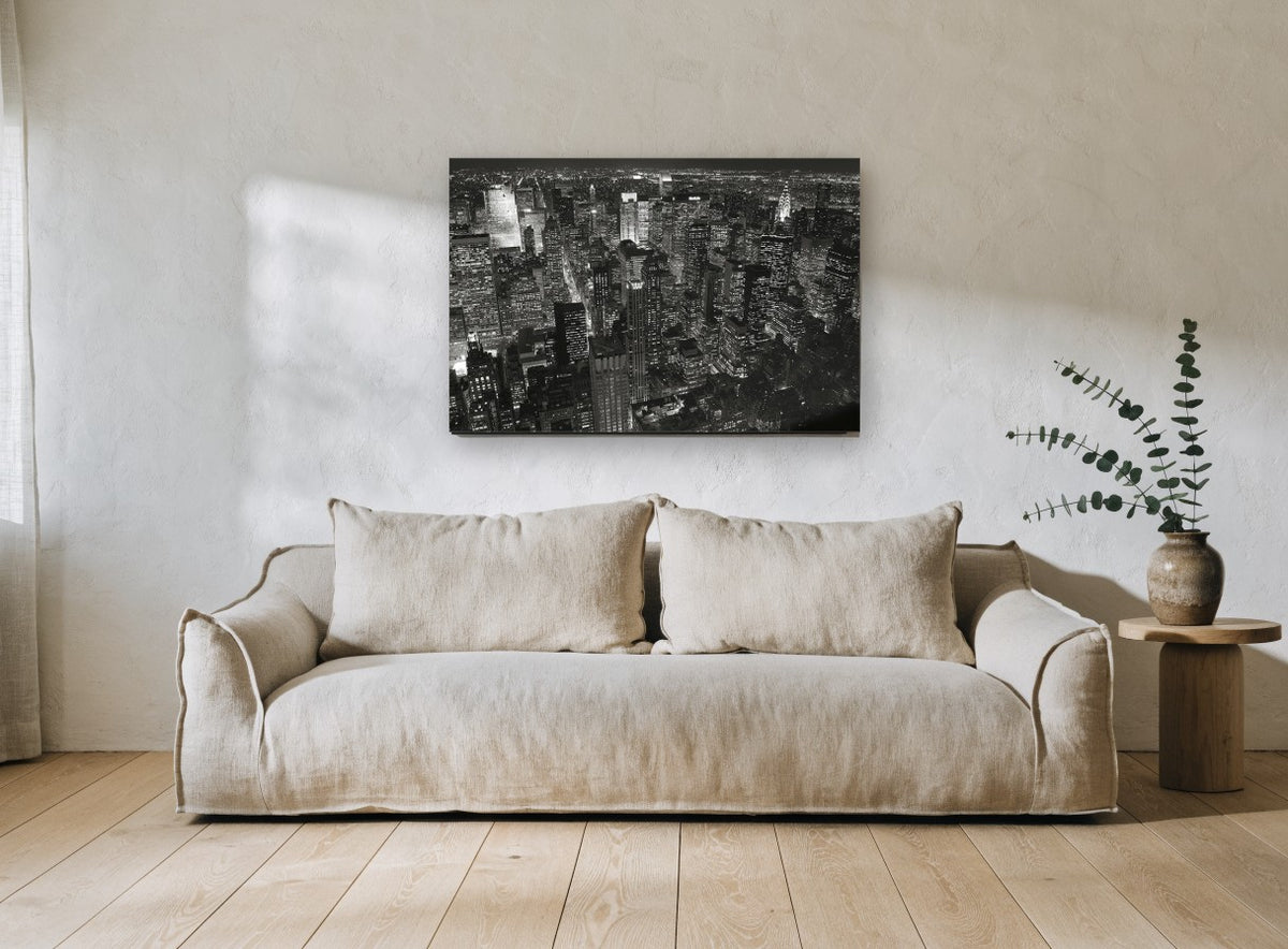 Midtown After Dark city canvas print on the wall of a living room