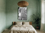 Empire State Looking Up city canvas print on the wall of a bedroom