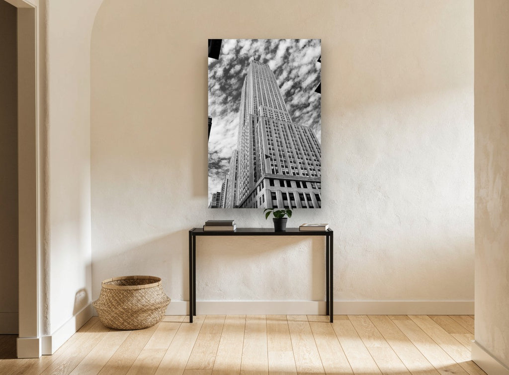 Empire State Looking Up city canvas print on the wall of a hallway
