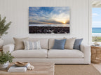 Low Tide Sunset Rocks coastal canvas print on the wall of a beach house living room