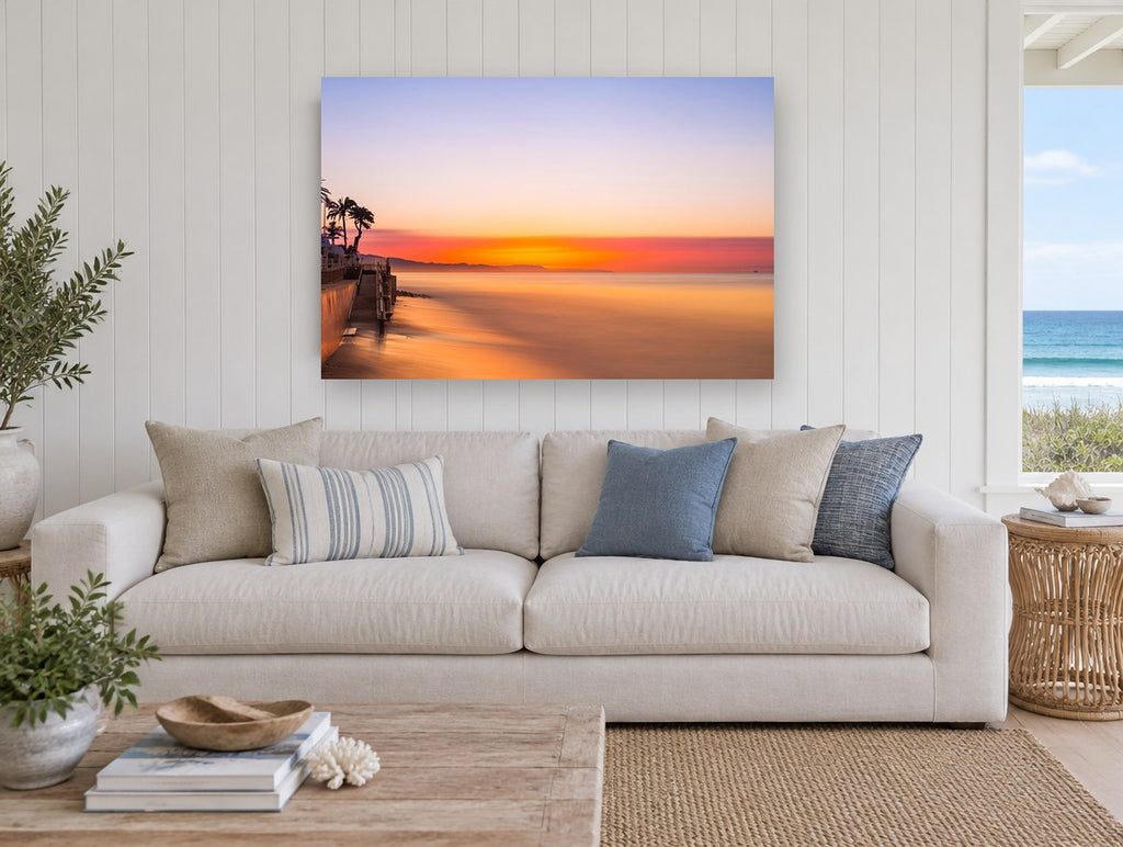 Glassy Dawn Shoreline coastal canvas print on the wall of a beach house living room