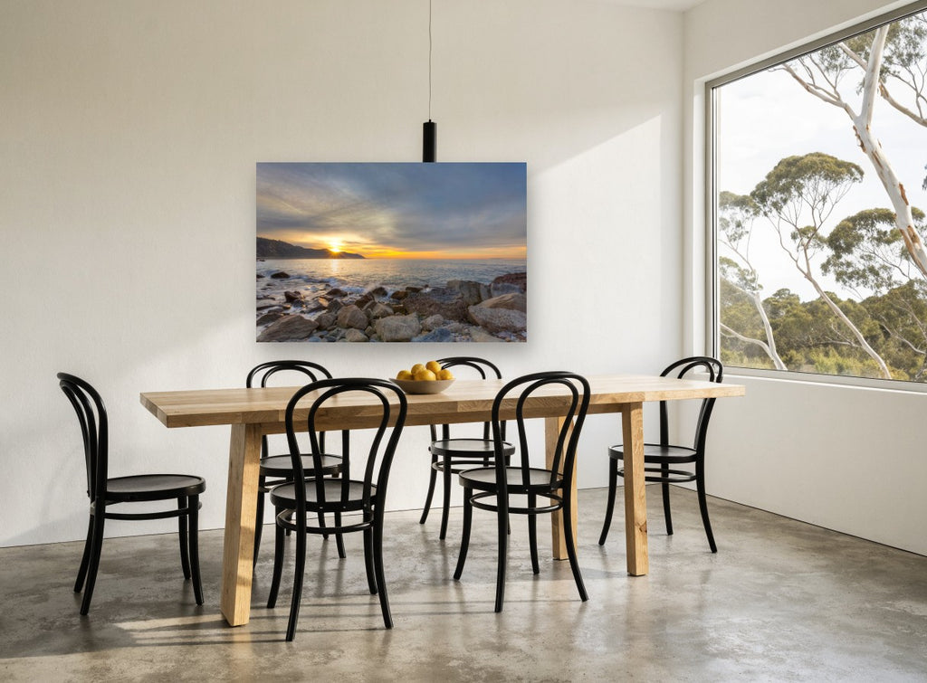 Sunrise Over Rocky Shore coastal canvas print on the wall of a dining room