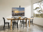 Sunrise Over Rocky Shore coastal canvas print on the wall of a dining room