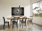 Butterfly on Woven Mesh animal canvas print on the wall of a dining room