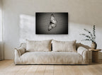 Butterfly on Woven Mesh animal canvas print on the wall of a living room