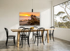 Driftwood Stump at Dusk coastal canvas print on the wall of a dining room