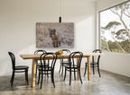 Wary Grey Fox animal canvas print on the wall of a dining room