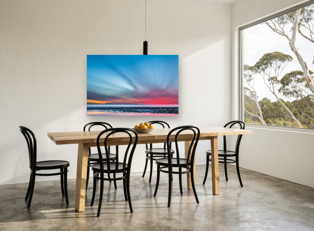 Streaked Dusk Over Low Tide coastal canvas print on the wall of a dining room
