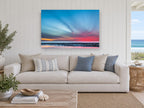 Streaked Dusk Over Low Tide coastal canvas print on the wall of a beach house living room